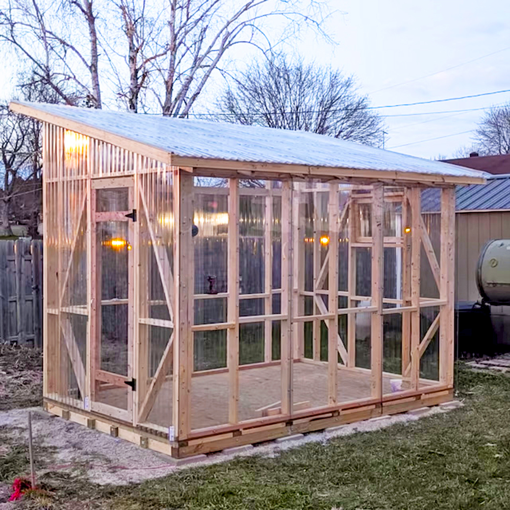 Customer-built 8x12 slanted roof greenhouse using CoopPlansDIY instructions